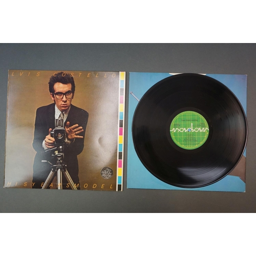 333 - Vinyl - Elvis Costello and Devo to include from Elvis Costrello 2 LP's My Aim Is True (German pressi... 