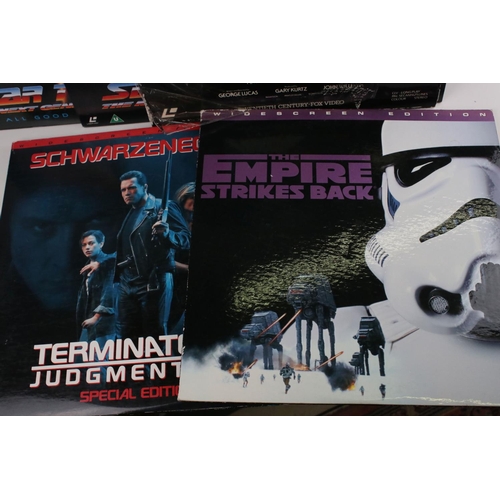 1087 - 18 Movie Laser Discs to include Terminator 2, Star Wars Empire Strikes Back, Starr Wars Star Trek Th... 