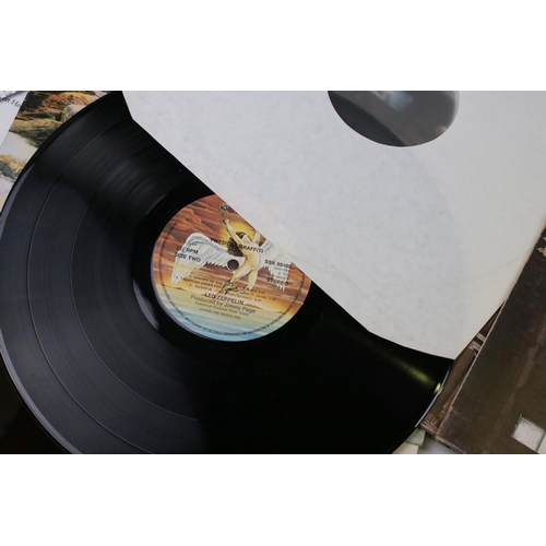 31 - Vinyl - Three Led Zeppelin LPs to include Physical Graffiti SSK89400, The Song Remains The Same SSK8... 