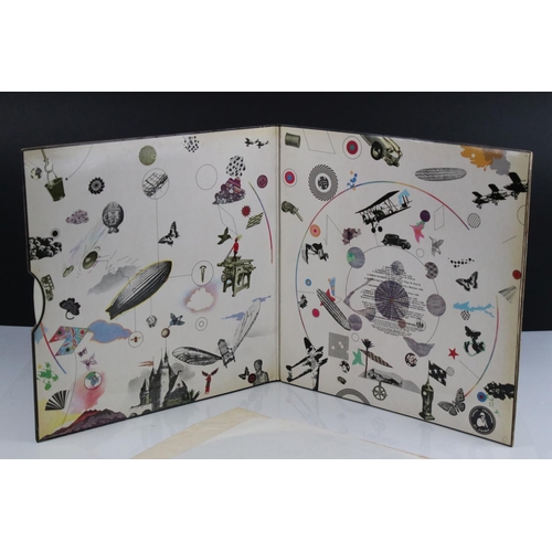 32 - Vinyl - Led Zeppelin III LP on Atlantic Deluxe 2401002 red/maroon label, 1st pressing, sleeve vg wit... 