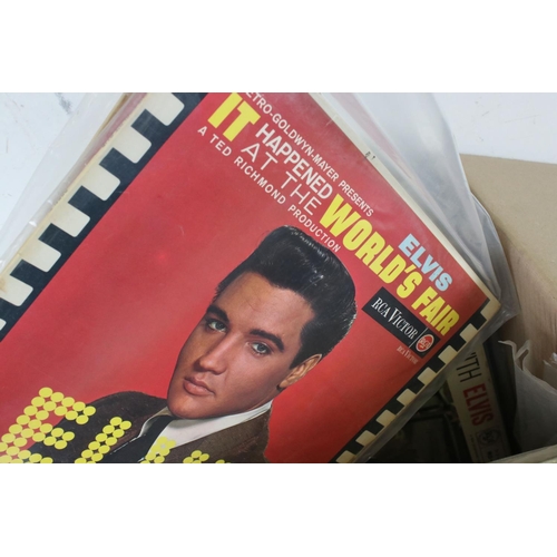 243 - Vinyl - Collection of approx 50 Elvis LP's spanning his career.  Condition varies but overall VG+