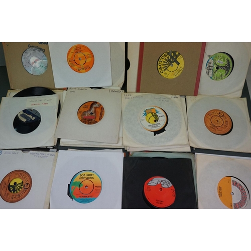 1474 - Vinyl - Approx 40 Reggae 45's featuring Trojan etc mainly in plain sleeves. Condition varies