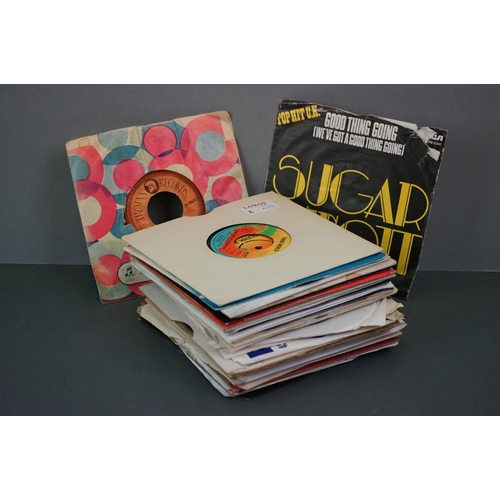 1474 - Vinyl - Approx 40 Reggae 45's featuring Trojan etc mainly in plain sleeves. Condition varies