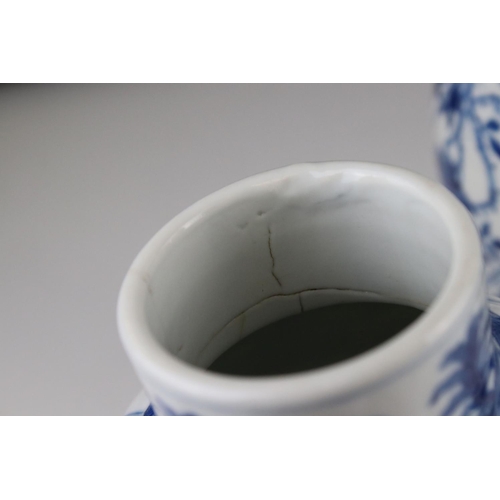 17 - Two Chinese blue and white lidded vases with floral decoration, both signed with six Character marks... 