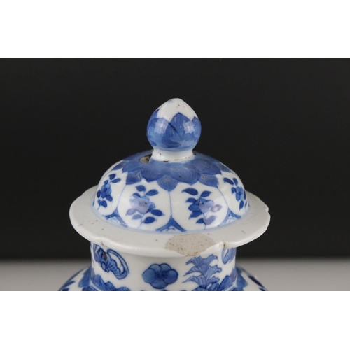 17 - Two Chinese blue and white lidded vases with floral decoration, both signed with six Character marks... 