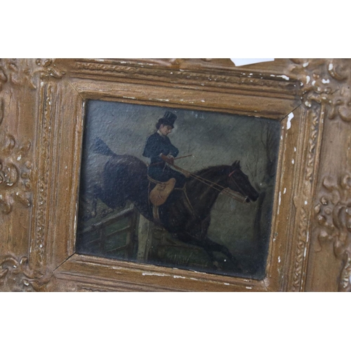 31 - Small gilt framed oil painting of a lady on horse jumping a gate, 10 x 12 cm.