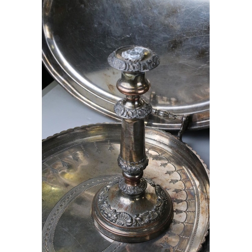 61 - A quantity of Silver plate and metal ware to include trays candle sticks tankards, toast racks, pepp... 