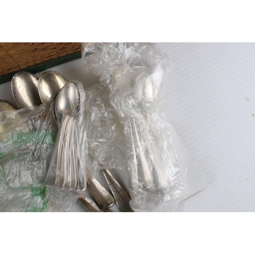 62 - A quantity of silver plated cutlery some boxed.