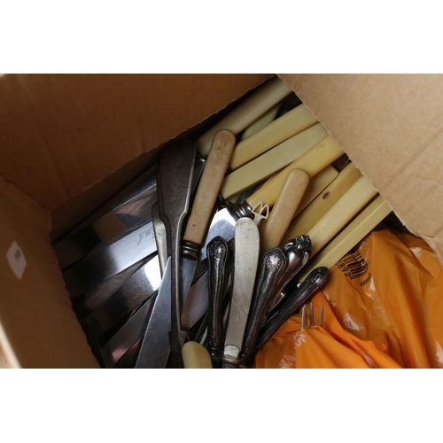 62 - A quantity of silver plated cutlery some boxed.