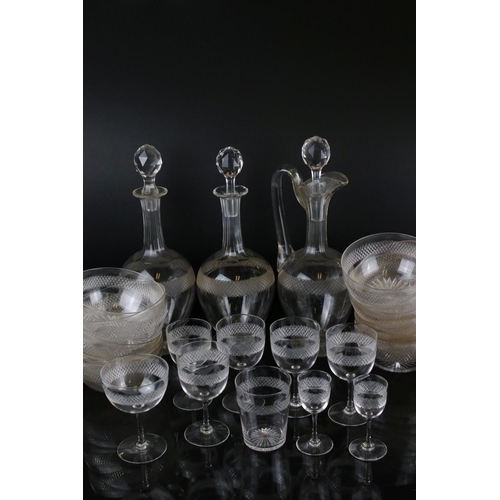 63 - A quantity of glass ware to include glasses, decanters, bowls, etc