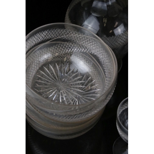 63 - A quantity of glass ware to include glasses, decanters, bowls, etc