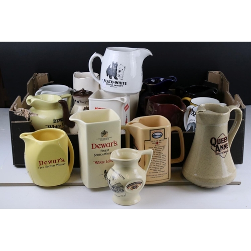 64 - A quantity of vintage ceramic pub advertising water jugs.