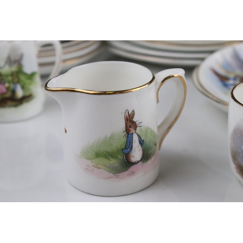 8 - Collection of Grimwades Beatrix Potter Tea Ware to include Saucers, Plates, Teapot, and Jugs (approx... 