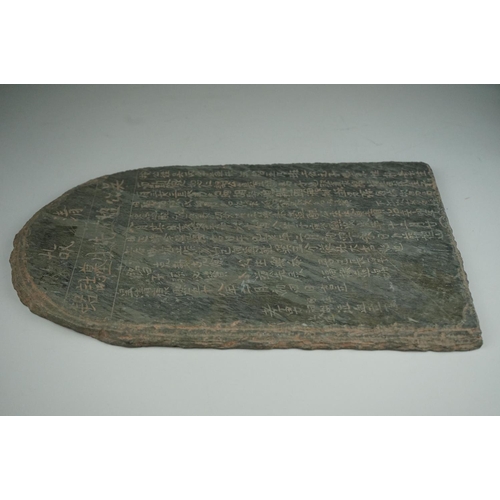 35 - Stone plaque inscribed with Chinese / Oriental Characters 36 x 23 cm.