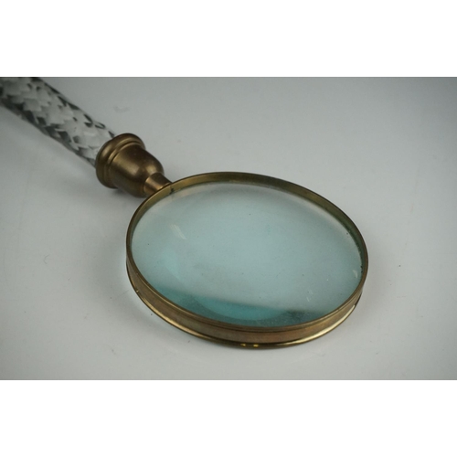 51 - A large glass handled vintage magnifier, 33 cm long.