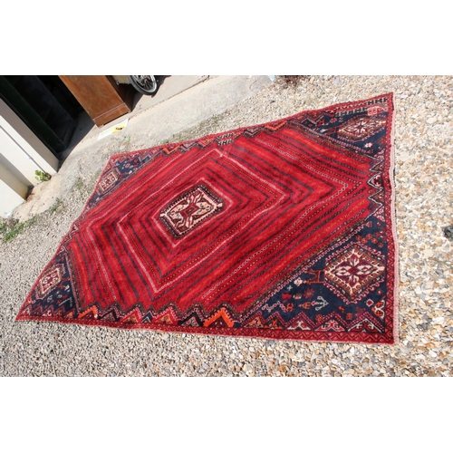 791 - Red ground, vintage persian Qashqai tribal carpet, patch on one corner and in middle