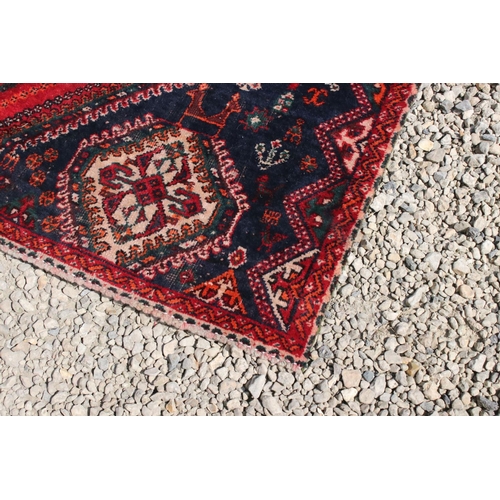 791 - Red ground, vintage persian Qashqai tribal carpet, patch on one corner and in middle