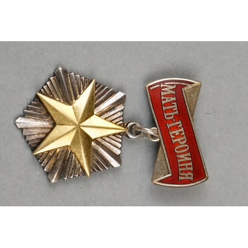 10 - A Russian / Soviet Order Of Mother Heroine Medal, White Metal With Gold Centre Star Mounted With Thr... 