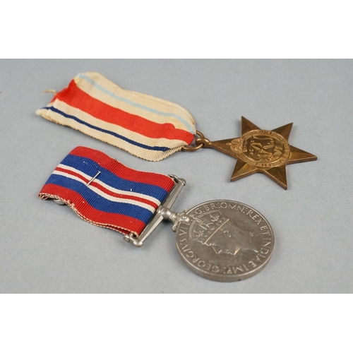 42 - A British World War Two Full Size Medal Group Of Four To Include The 1939-45 British War Medal, The ... 