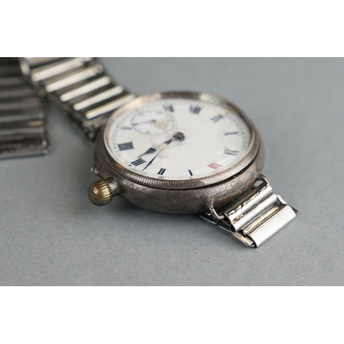 52 - A World War One Era Trench Watch, White Enamel Dial With Subsidiary Second Hand To The 6 O'Clock Pos... 