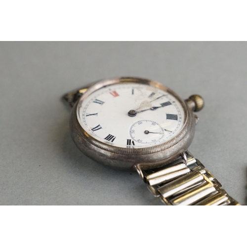 52 - A World War One Era Trench Watch, White Enamel Dial With Subsidiary Second Hand To The 6 O'Clock Pos... 