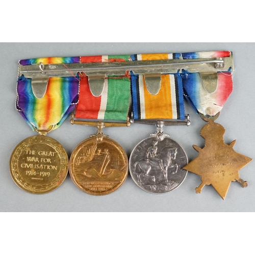 58 - A British World War One Full Size Medal Group Of Four To Include The 1914-1918 British Was Medal, Th... 