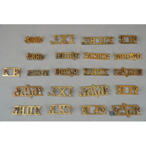 138 - A Collection Of Approx 20 x British Military Brass Lancers And Hussars Shoulder Titles.