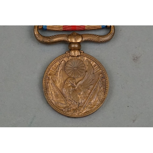 135A - A Full Size World War Two Sino Japanese War Medal, Complete With Original Ribbon And In Original Iss... 