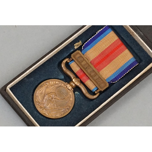 135A - A Full Size World War Two Sino Japanese War Medal, Complete With Original Ribbon And In Original Iss... 