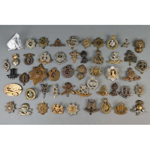 143 - A Large Collection Of Approx 50 x Mainly British Military Cap Badges To Include The Queens Own Worce... 