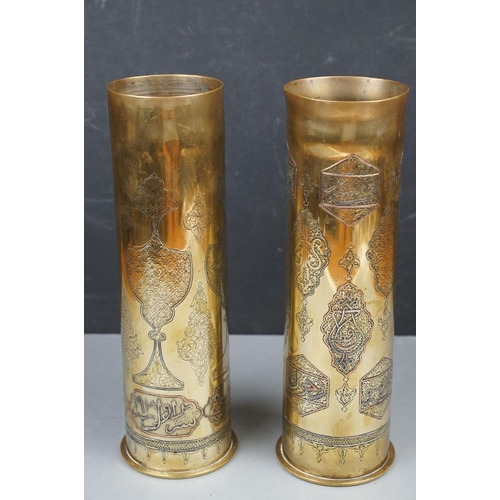 151 - A Pair Of World War One Trench Art Brass Shell Cases With Ornate Arabic Decoration And Marked Damasc... 