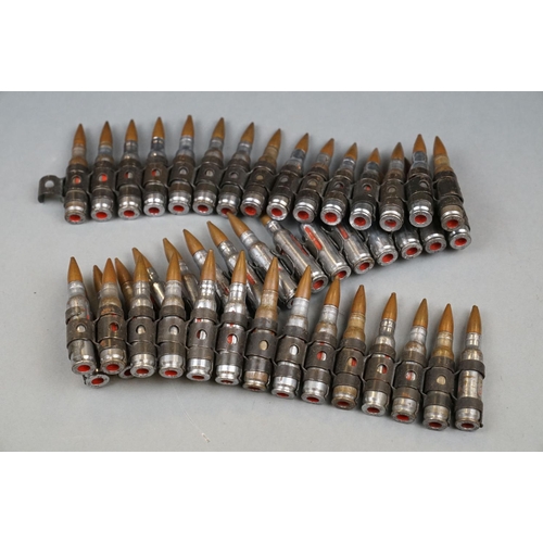 164 - A Bullet Belt Of Approx 40 x 7.62mm Training Rounds.