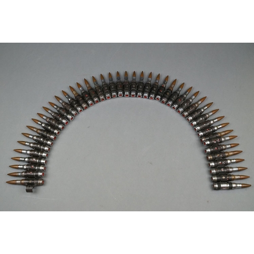 164 - A Bullet Belt Of Approx 40 x 7.62mm Training Rounds.