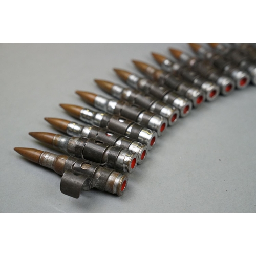 164 - A Bullet Belt Of Approx 40 x 7.62mm Training Rounds.