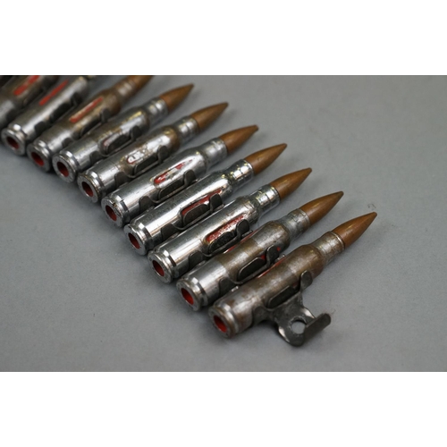 164 - A Bullet Belt Of Approx 40 x 7.62mm Training Rounds.