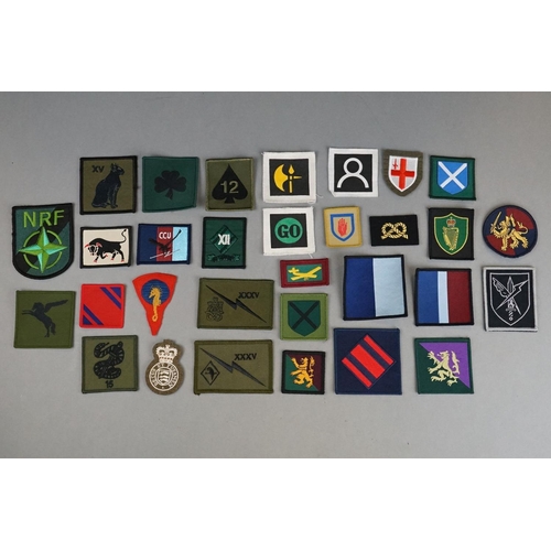 170 - A Mixed Collection Of Approx Thirty Military Cloth Patches / Badges.