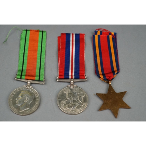 252 - A Full Size British World War Two Medal Group Of Three To Include The 1939-1945 British War Medal, T... 