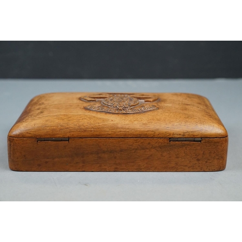 253 - A Wooden Cigarette Box With Carved Lid Badged To The Queen Victoria's Own Madras Sappers And Miners ... 