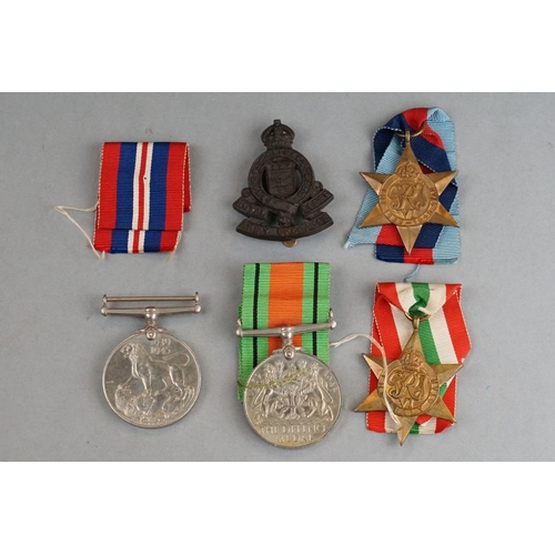 40A - A British Full Size World War Two Medal Group Of Four To Include The 1939-1945 British War Medal, Th... 