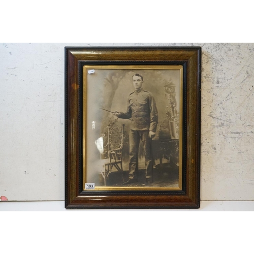 193 - A Large World War One Framed And Glazed Photograph Of A Soldier In Uniform With Pith Helmet, Measure... 