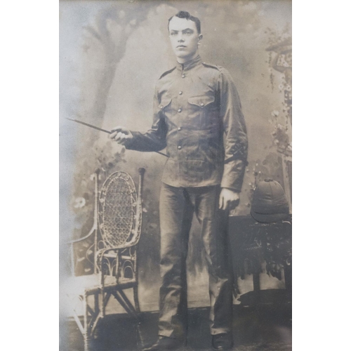 193 - A Large World War One Framed And Glazed Photograph Of A Soldier In Uniform With Pith Helmet, Measure... 