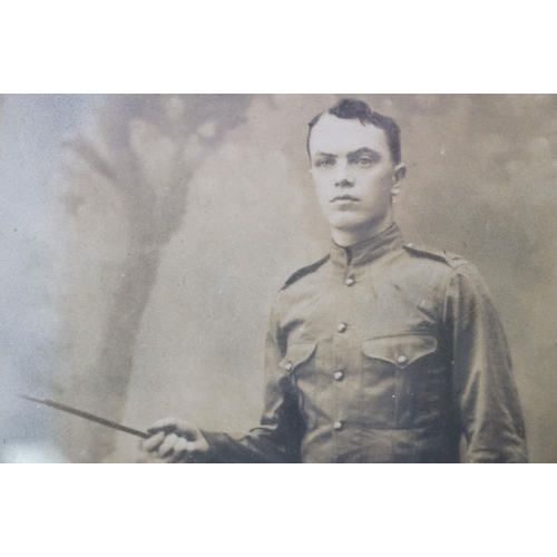 193 - A Large World War One Framed And Glazed Photograph Of A Soldier In Uniform With Pith Helmet, Measure... 