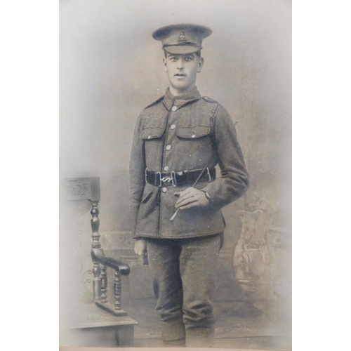 194 - A Large World War One Framed And Glazed Photograph Of A Soldier In Uniform, Measures Approx 59cm x 4... 