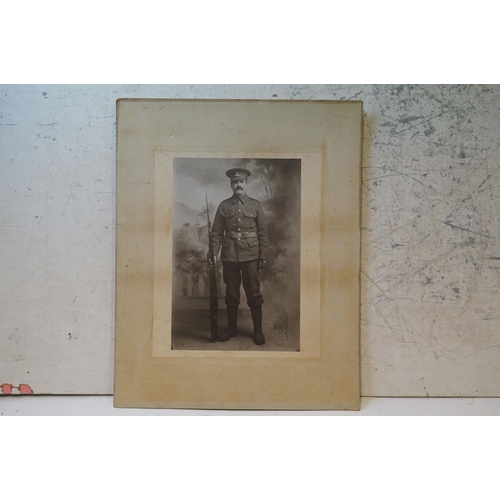 196 - A Large World War One Card Mounted Photograph Of A Soldier (William Rose Of Devizes) In Regimental U... 