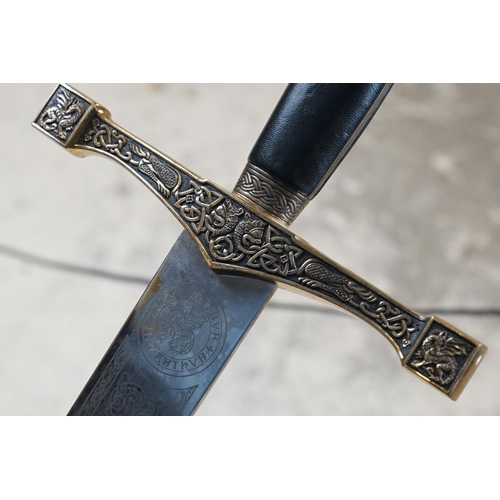 216 - A Reproduction King Arthurs Excalibur Sword, Decorative Celtic Hilt And Pommel With Engraved Blade, ... 