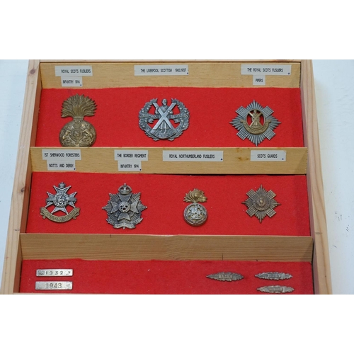 298 - A Large Collection Of Military Cap Badges Contained And Mounted Within A Pine Seven Drawer Collector... 