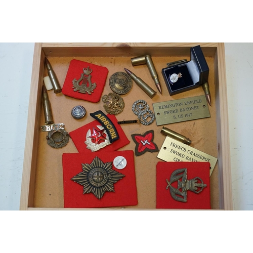 298 - A Large Collection Of Military Cap Badges Contained And Mounted Within A Pine Seven Drawer Collector... 