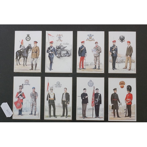 331 - A Collection Of Twenty Four Framed And Glazed Military Regimental Collectors Cards.