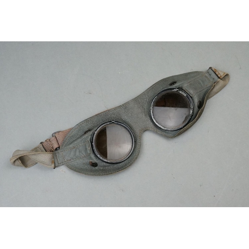 340 - A Pair Of World War Two German General Purpose Tinted Goggles Together With A Coat Hanger.