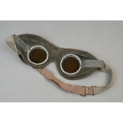 340 - A Pair Of World War Two German General Purpose Tinted Goggles Together With A Coat Hanger.